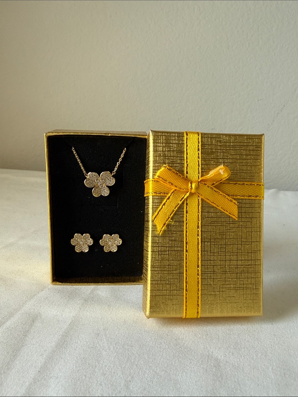Sparkling Flower Pendant Necklace with Matching Stud Earrings